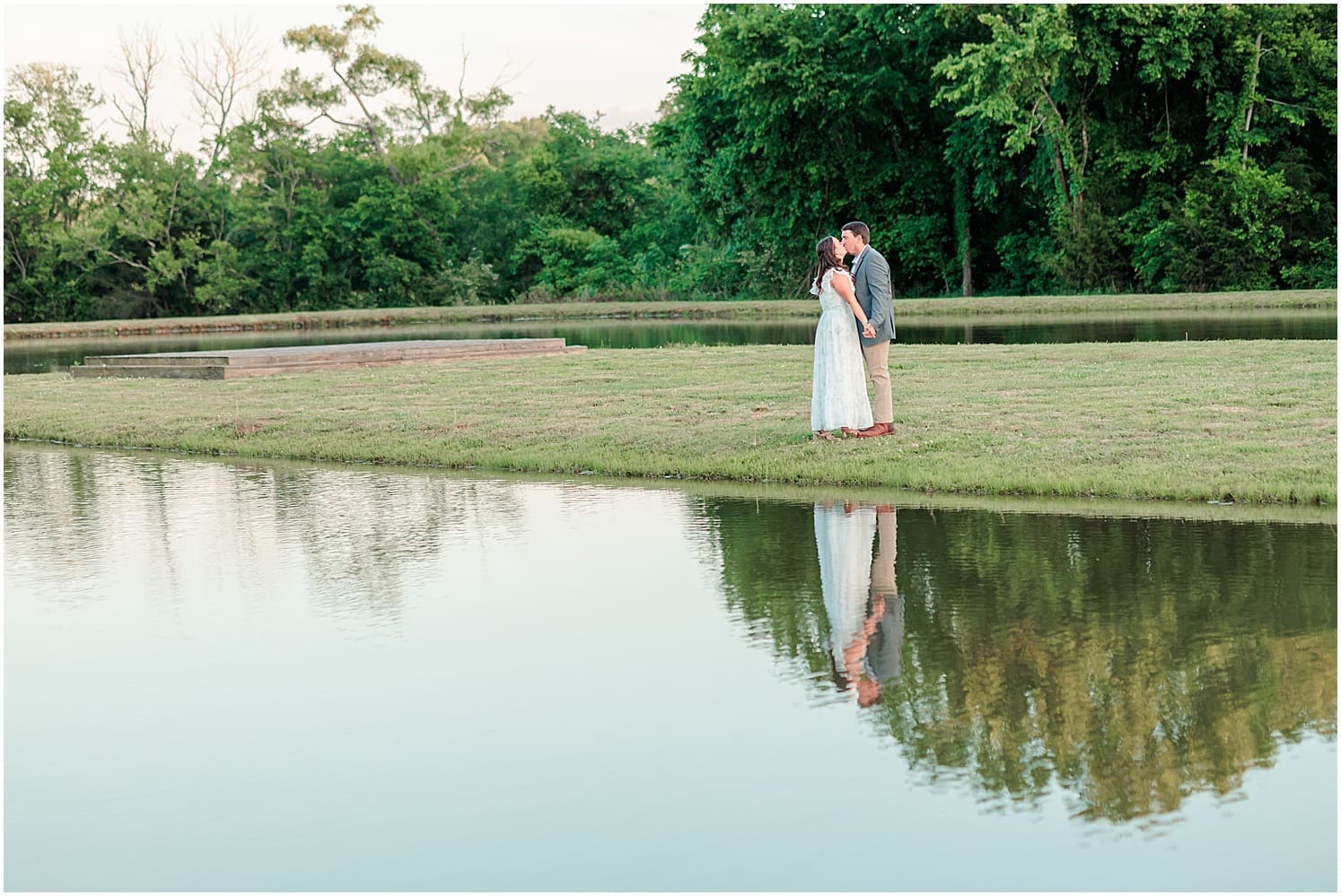 Couple walking near the pond at Grace Valley Farm in Shelbyville Tennessee