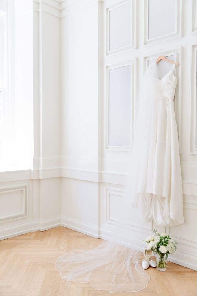 Wedding dress hanging in the Sadee gallery at the Noelle Hotel