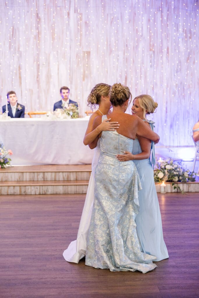 Mom dancing with her daughters