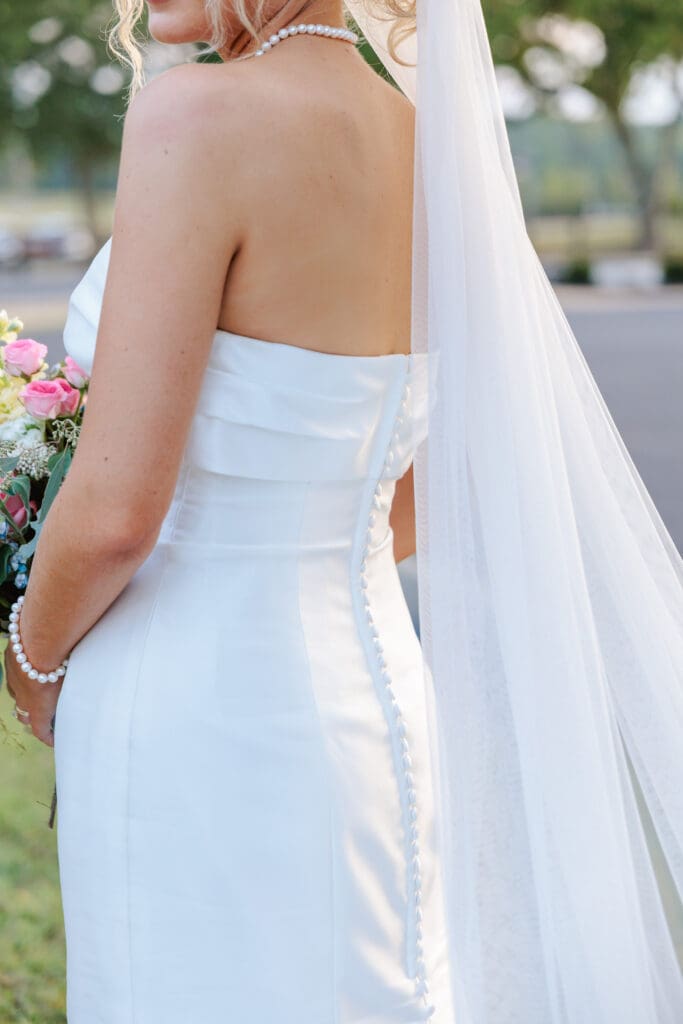 Claire's wedding dress buttons