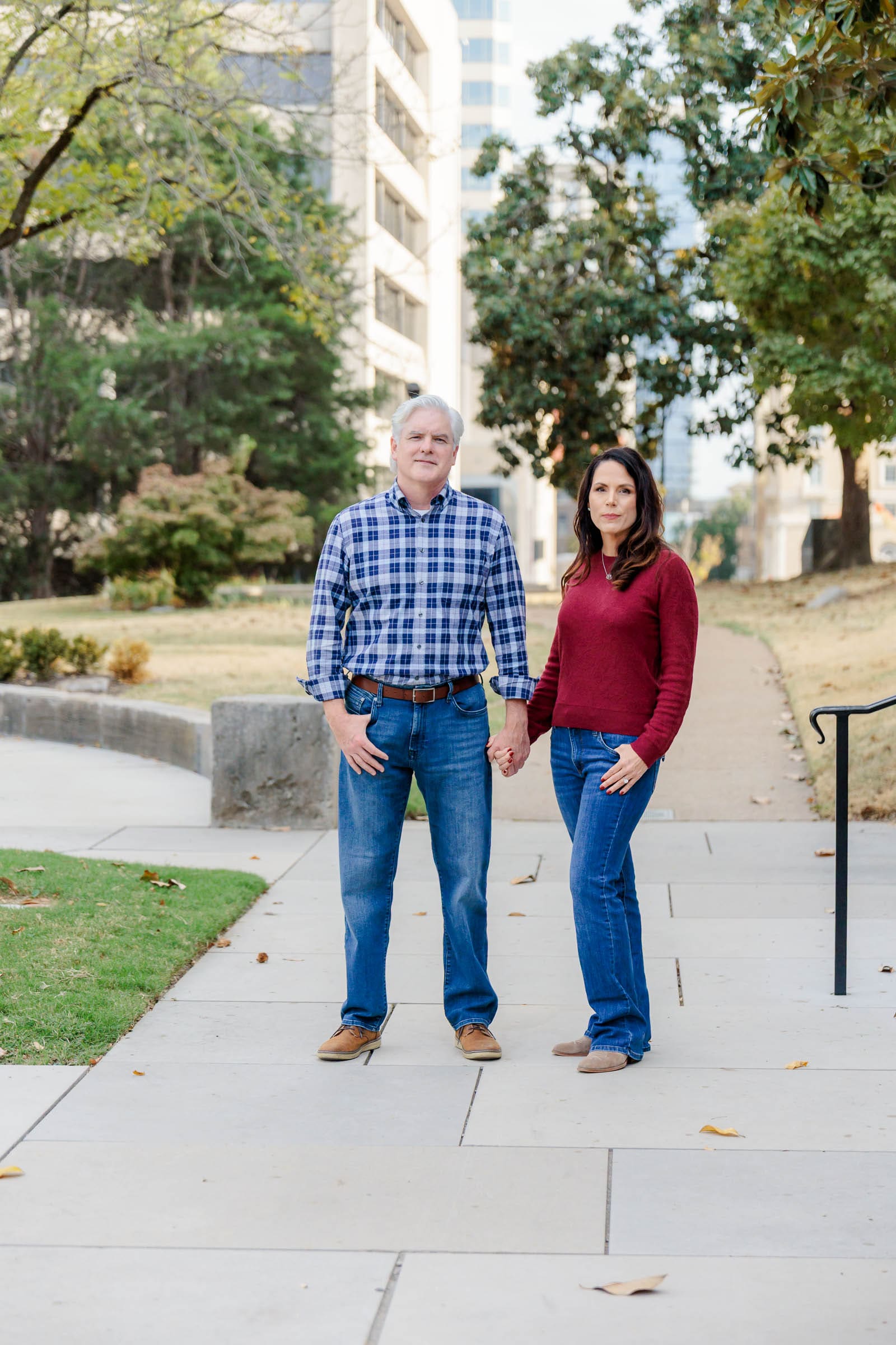 Michael and Sarah standing together beneath the trees in Downtown Nashville