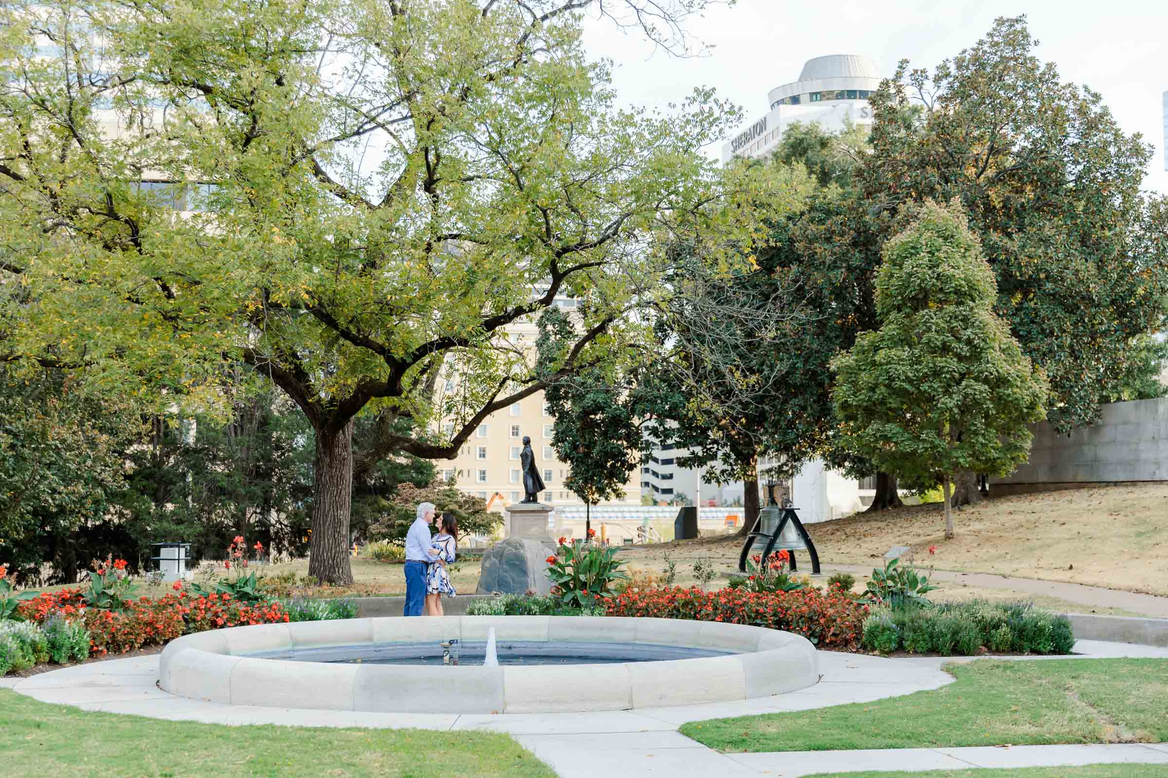 Sarah and Michael dancing playfully together in a Downtown Nashville park