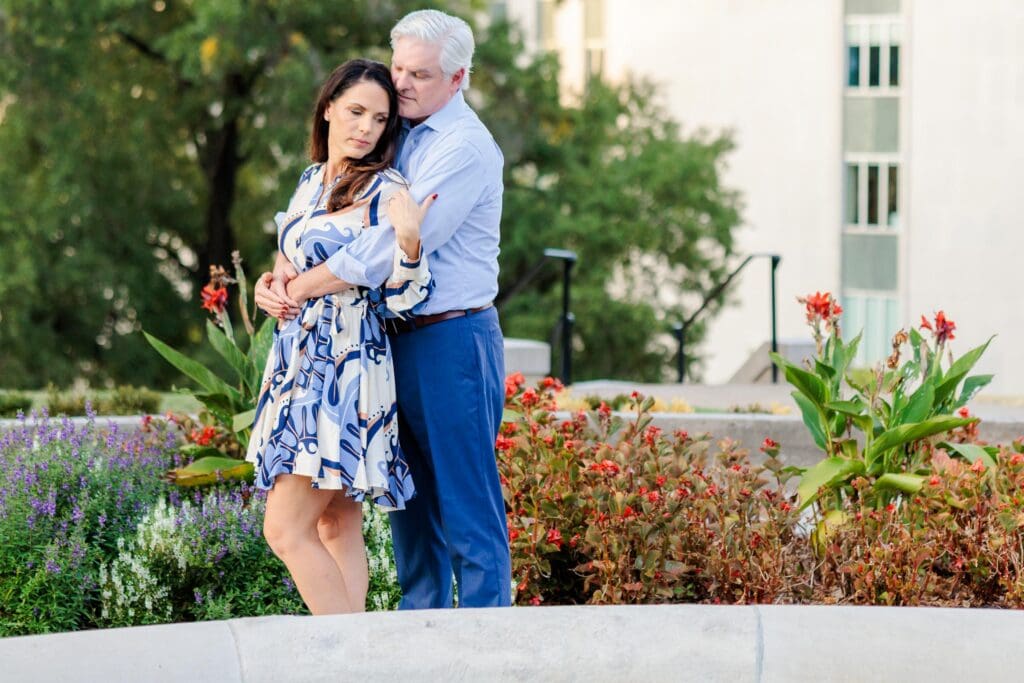 Couple in an embrace in a beautiful garden