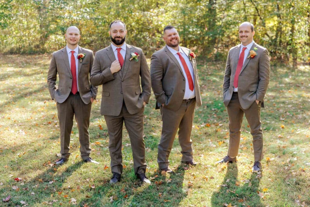 Groom posing with groomsmen at Firefly Lane