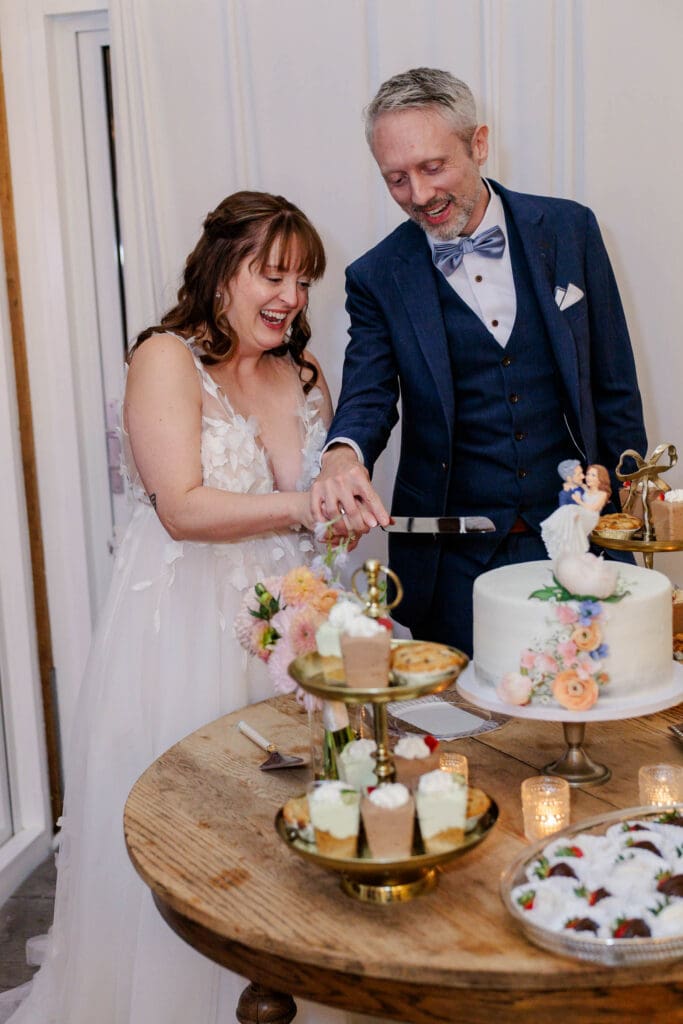 Reception cake cutting at Iriswoods in Mt. Juliet, Tennessee