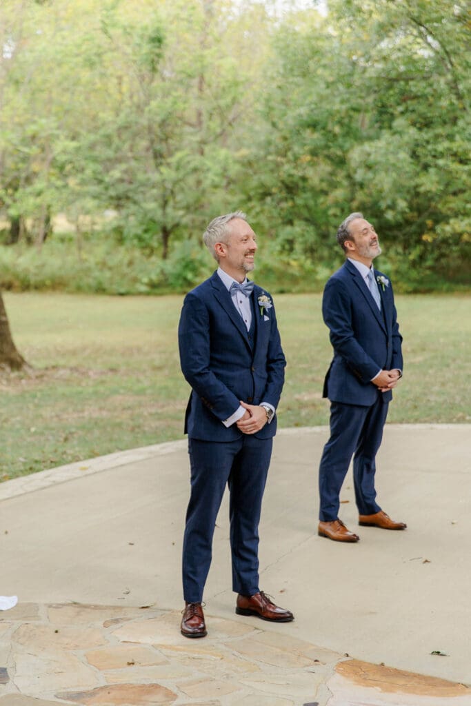 Groom watching bride walk down the aisle at Iriswoods in Mt. Juliet, TN