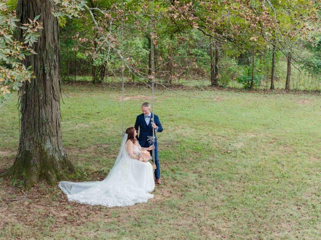 Bride and groom swing portraits at Iriswoods in Mt. Juliet, TN