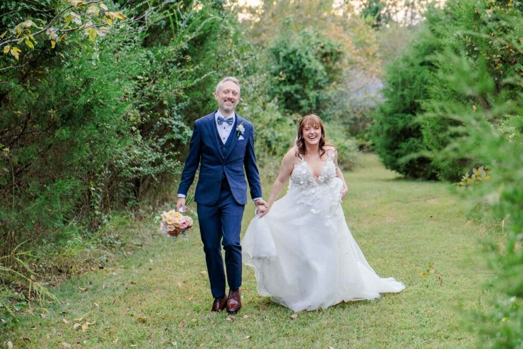 Bride and groom walking on the grounds of Iriswoods wedding venue inn Mt. Juliet, TN