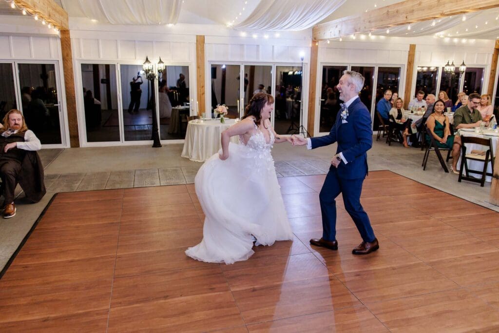 Bride and groom first dance at Iriswoods wedding venue