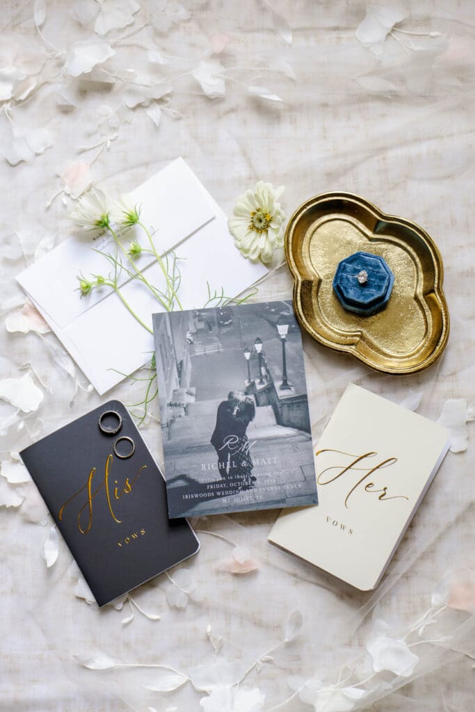 Bride and groom's rings and vow books at Iriswooods in Mt. Juliet, TN