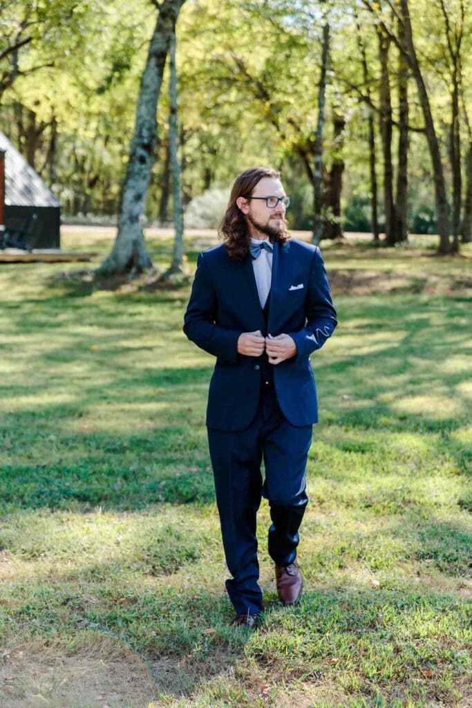 Portraits of Groom Logan before the ceremony