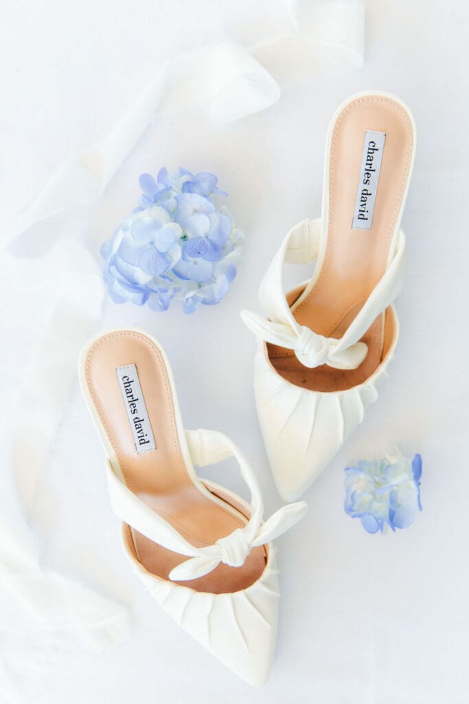 Wedding shoes in white, light blue at Jubilee Woods