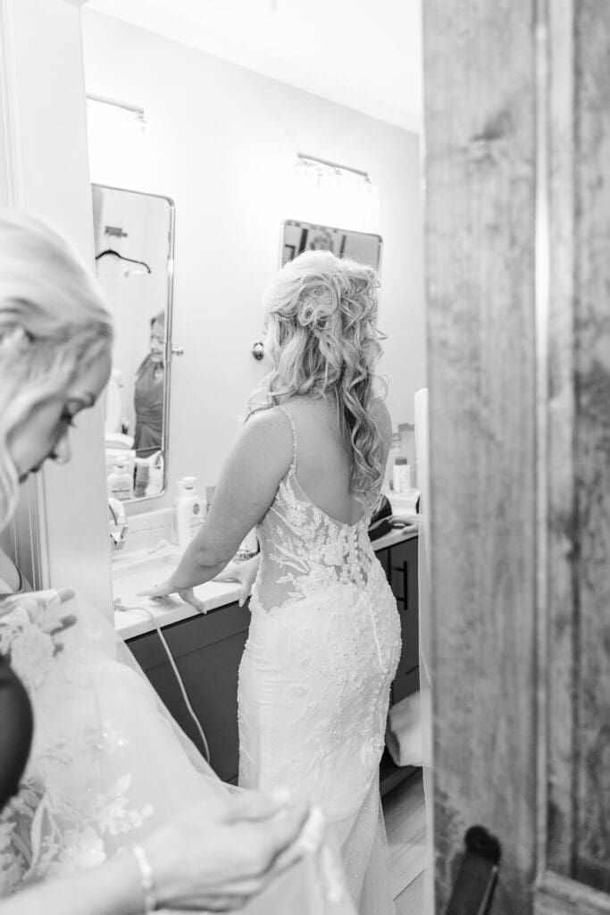 Bride getting dressed in Middle Tennessee