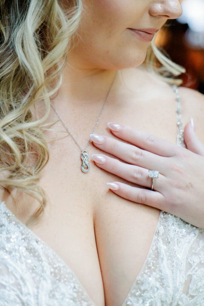 Bridal pictures showing her necklace and ring for her wedding day near Hendersonville, Tennessee.