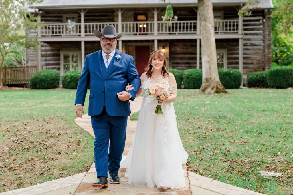 Bride walking down the aisle at Iriswoods in Mt. Juliet, TN