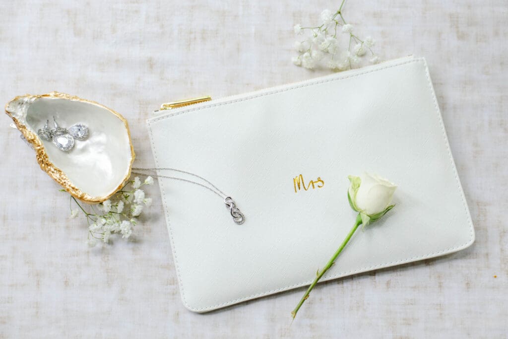 Wedding jewelry and makeup bag details near Gallatin, Tennessee