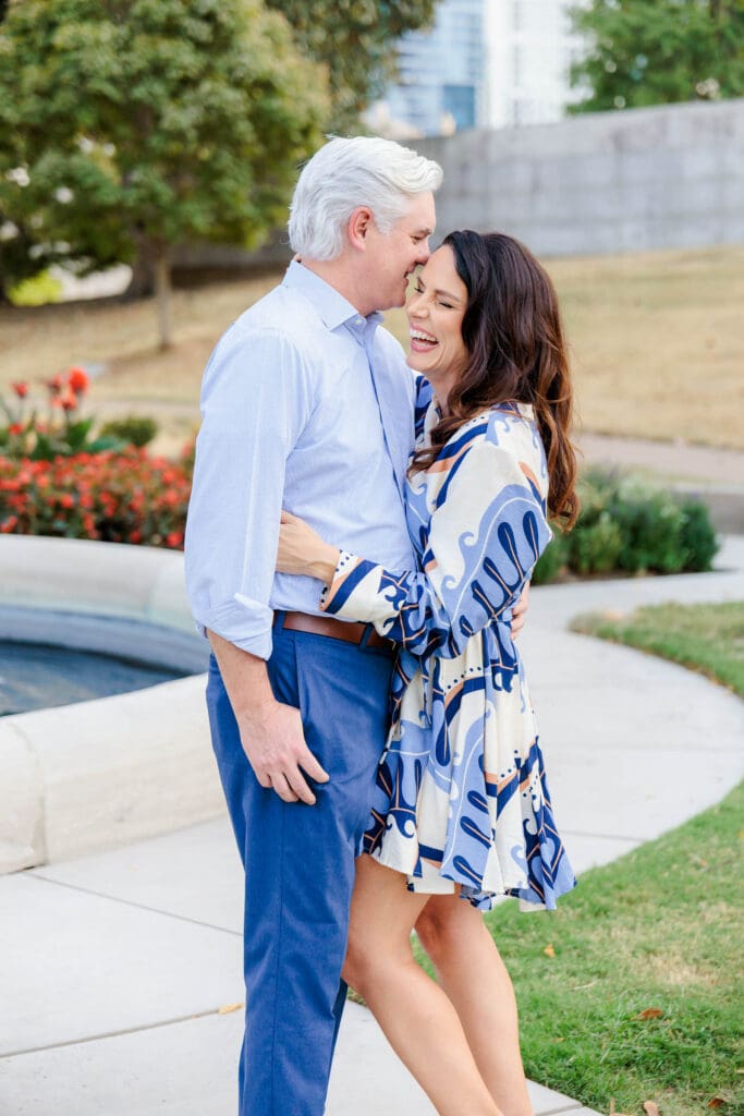 Engaged couple sharing a playful moment in Nashville